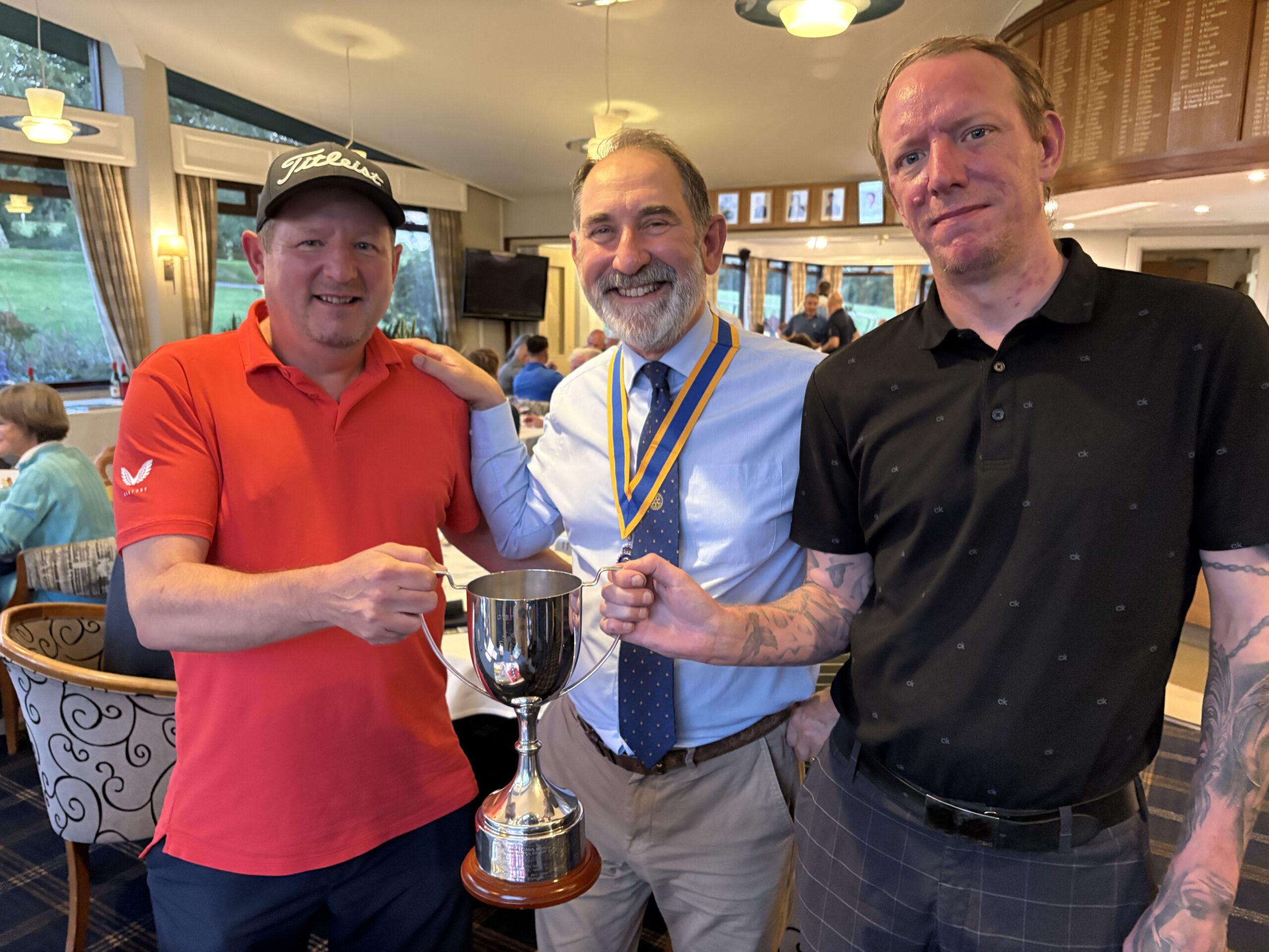 Men standing with Cup